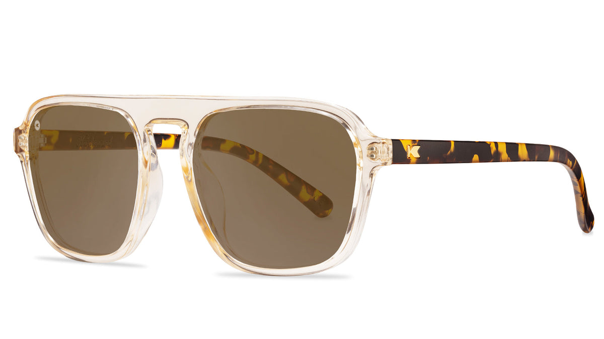 Sunglasses with Glossy translucent amber fronts Matte tortoise shell arms Polarized amber lenses