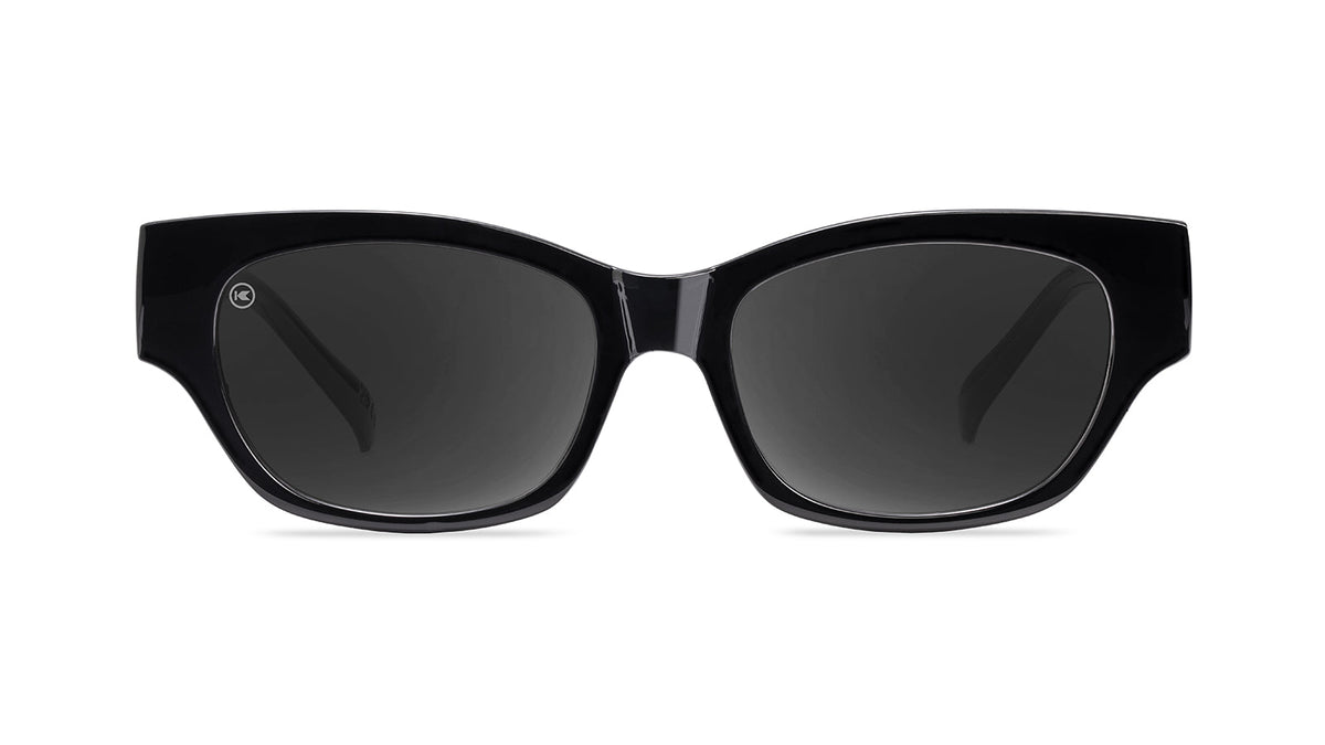 Sunglasses with a glossy black frame and polarized smoke lenses, Front
