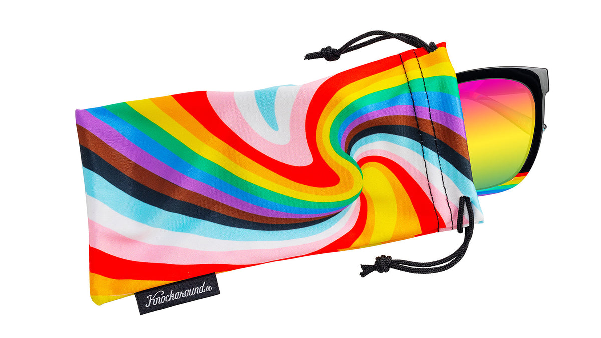 Sunglasses with Glossy black fronts with rainbow accent at bottom, Progress Pride color swirl across arms Silver K-logos Polarized rainbow lenses