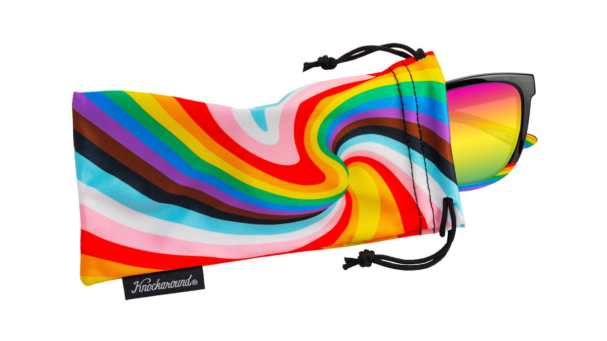 Sunglasses with Glossy black fronts with rainbow accent at bottom, Progress Pride color swirl across arms Silver K-logos Polarized rainbow lenses