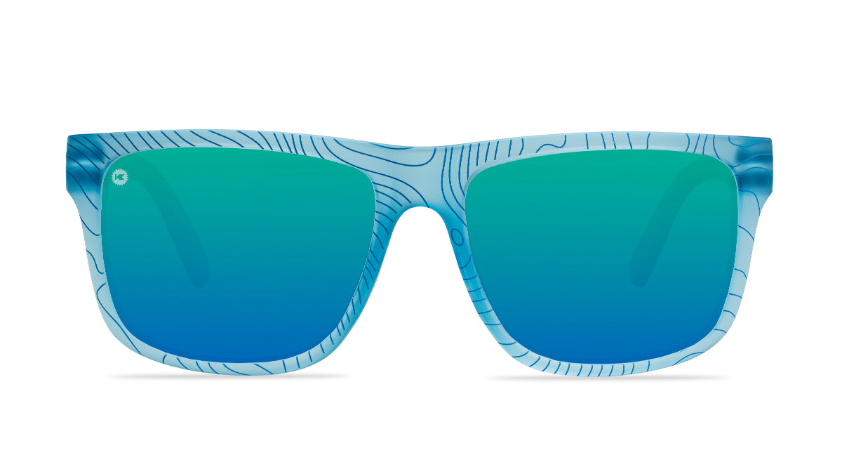 Sunglasses with blue topographic frames and polarized green lenses, flyover