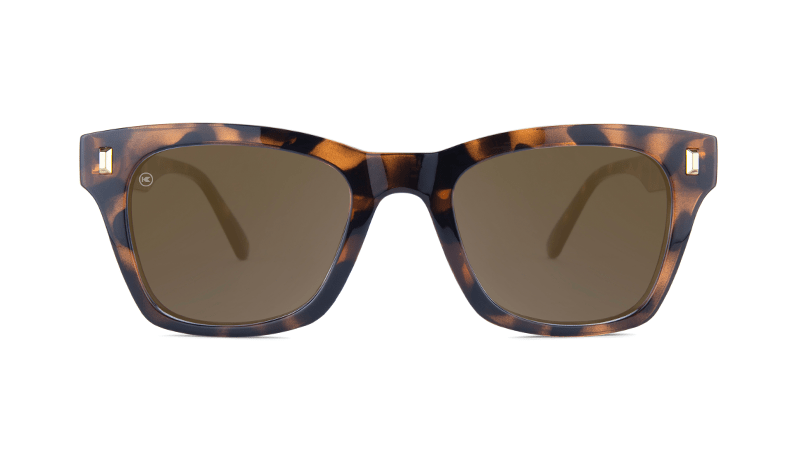 Sunglasses with Glossy Tortoise Shell Frames and Polarized Amber Lenses, Flyover